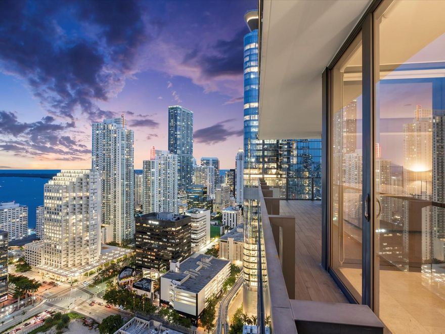 Best-priced high-floor corner unit at Reach at Brickell City Centre! Enjoy sweeping views of Biscayne Bay and the glittering Brickell skyline - stunning by day and dazzling at night. Open-concept layout is enhanced by floor-to-ceiling windows that flood the space with natural light. Impeccable finishes include Italkraft cabinetry, premium Bosch appliances, and a thoughtfully designed split-bedroom floor plan with en-suite bathrooms. Reach residents enjoy EXCLUSIVE DIRECT access to Brickell City Centre with its world-class dining, shopping, and entertainment. The building offers an expansive amenity deck featuring two pools, a state-of-the-art fitness center, a children’s playroom, outdoor playground, business center, sophisticated party room, and a full-service spa.
