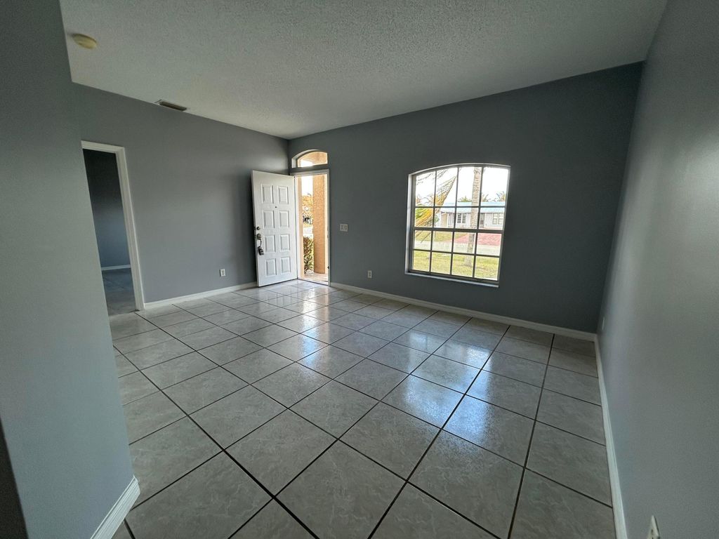 Photo of 974 SE Albatross Avenue, Port Saint Lucie, FL 34983 (MLS # R11169204)