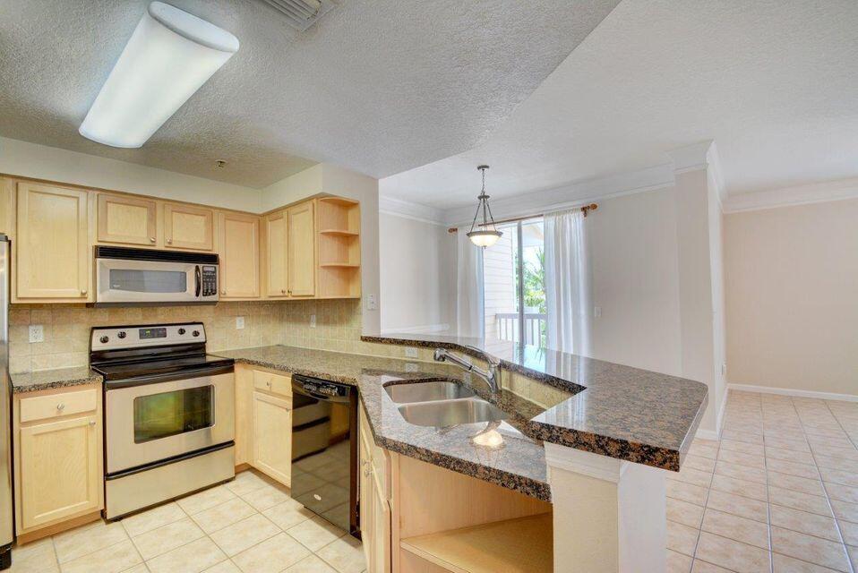 SOMERSET AT ABACOA CONDO - Residential