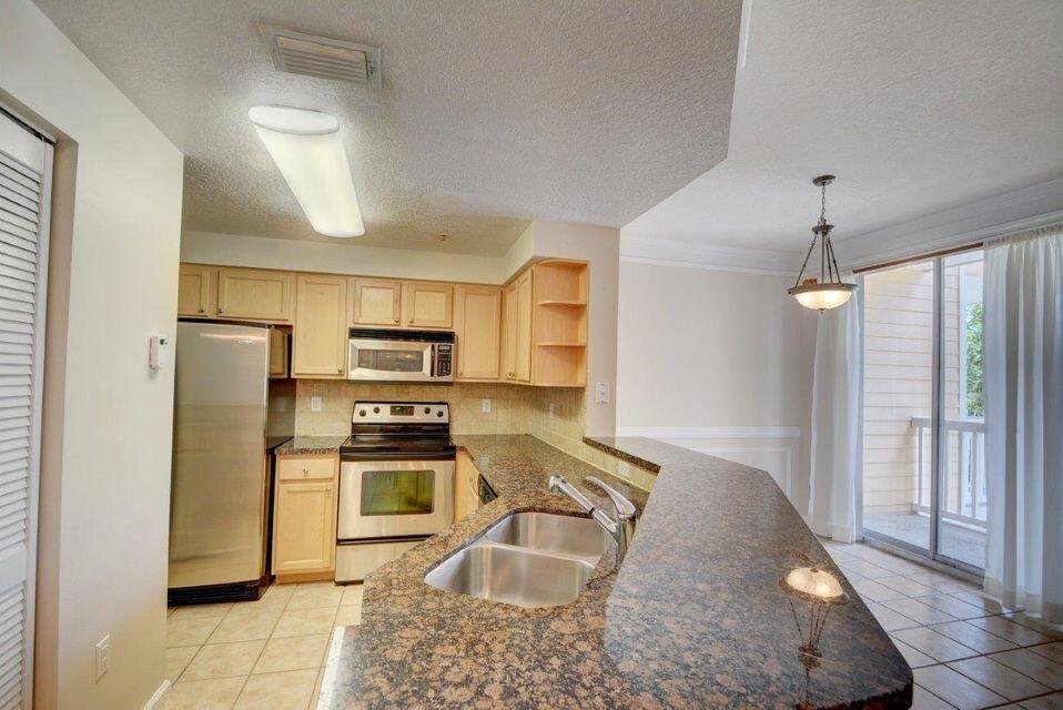 SOMERSET AT ABACOA CONDO - Residential