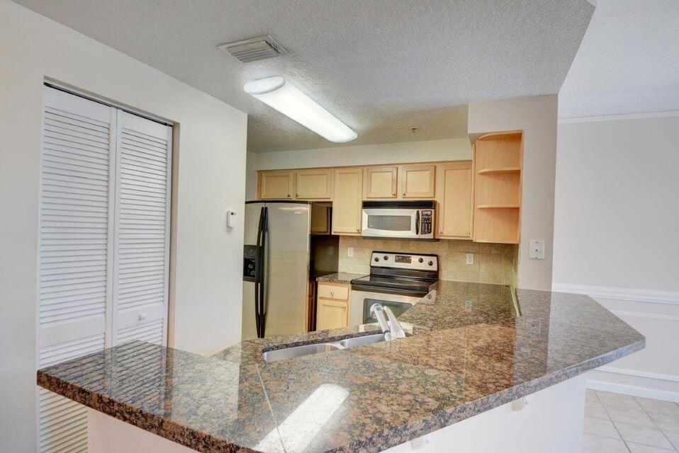 SOMERSET AT ABACOA CONDO - Residential