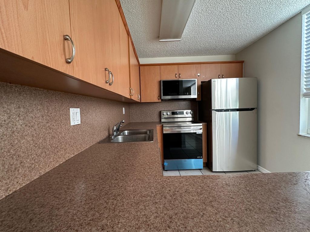 Photo of 9451 Evergreen Place #301, Davie, FL 33324 (MLS # F10493581)