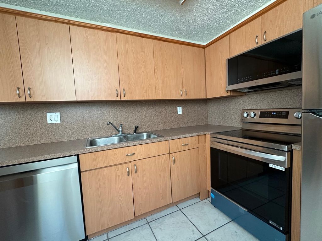 Photo of 9451 Evergreen Place #301, Davie, FL 33324 (MLS # F10493581)