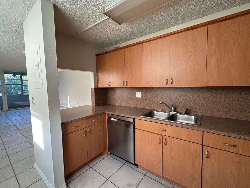 Photo of 9451 Evergreen Place #301, Davie, FL 33324 (MLS # F10493581)