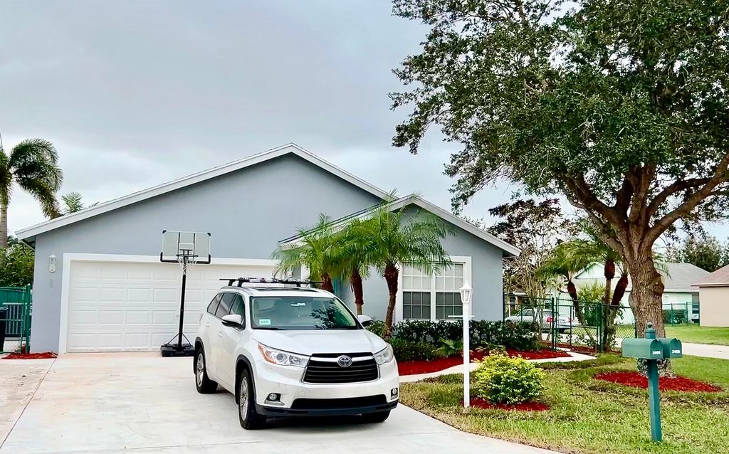 Photo of 2464 SW Omega Way, Stuart, FL 34997 (MLS # R10774893)