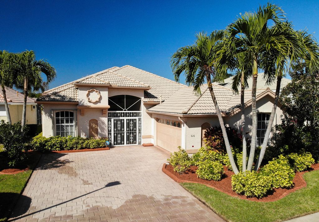 Photo of 616 SW Lake Charles Circle, Port St Lucie, FL 34986 (MLS # R10858036)