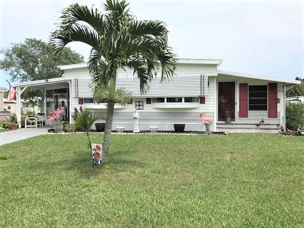 Photo of 18 Madrid Lane, Port Saint Lucie, FL 34952 (MLS # R10818067)