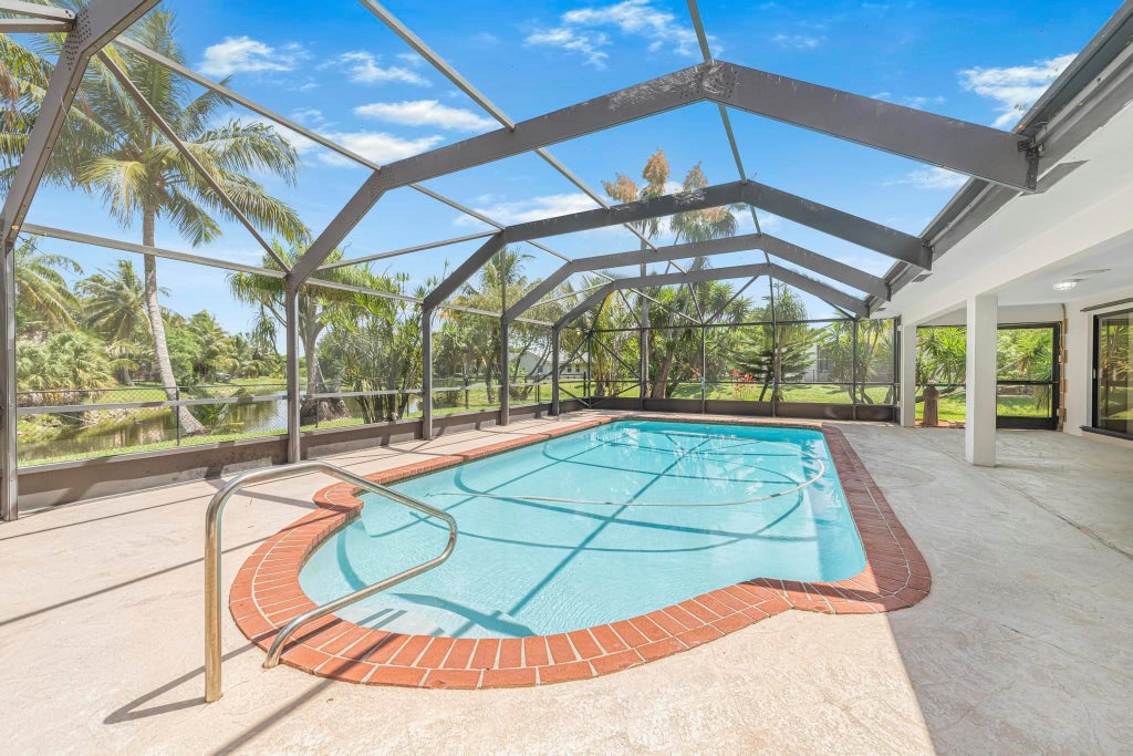 Photo of 2640 NW 115th Drive, Coral Springs, FL 33065 (MLS # F10512191)