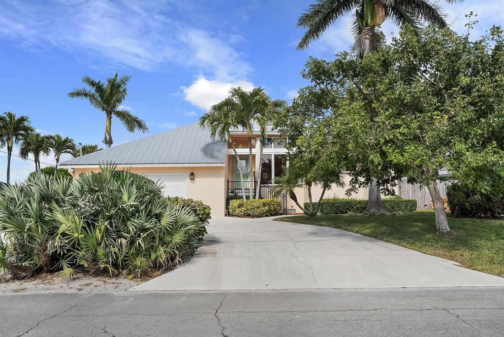 Photo of 5105 SE Matousek Street, Stuart, FL 34997 (MLS # R11083294)