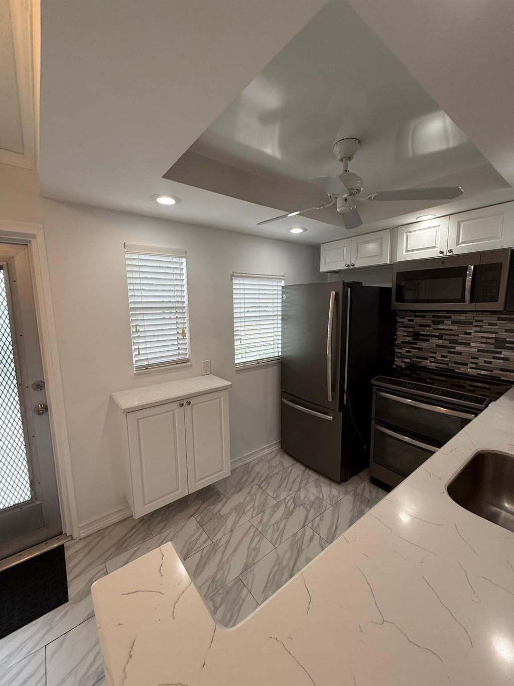 Photo of 2141 NE 1st Court #102, Boynton Beach, FL 33435 (MLS # F10527088)