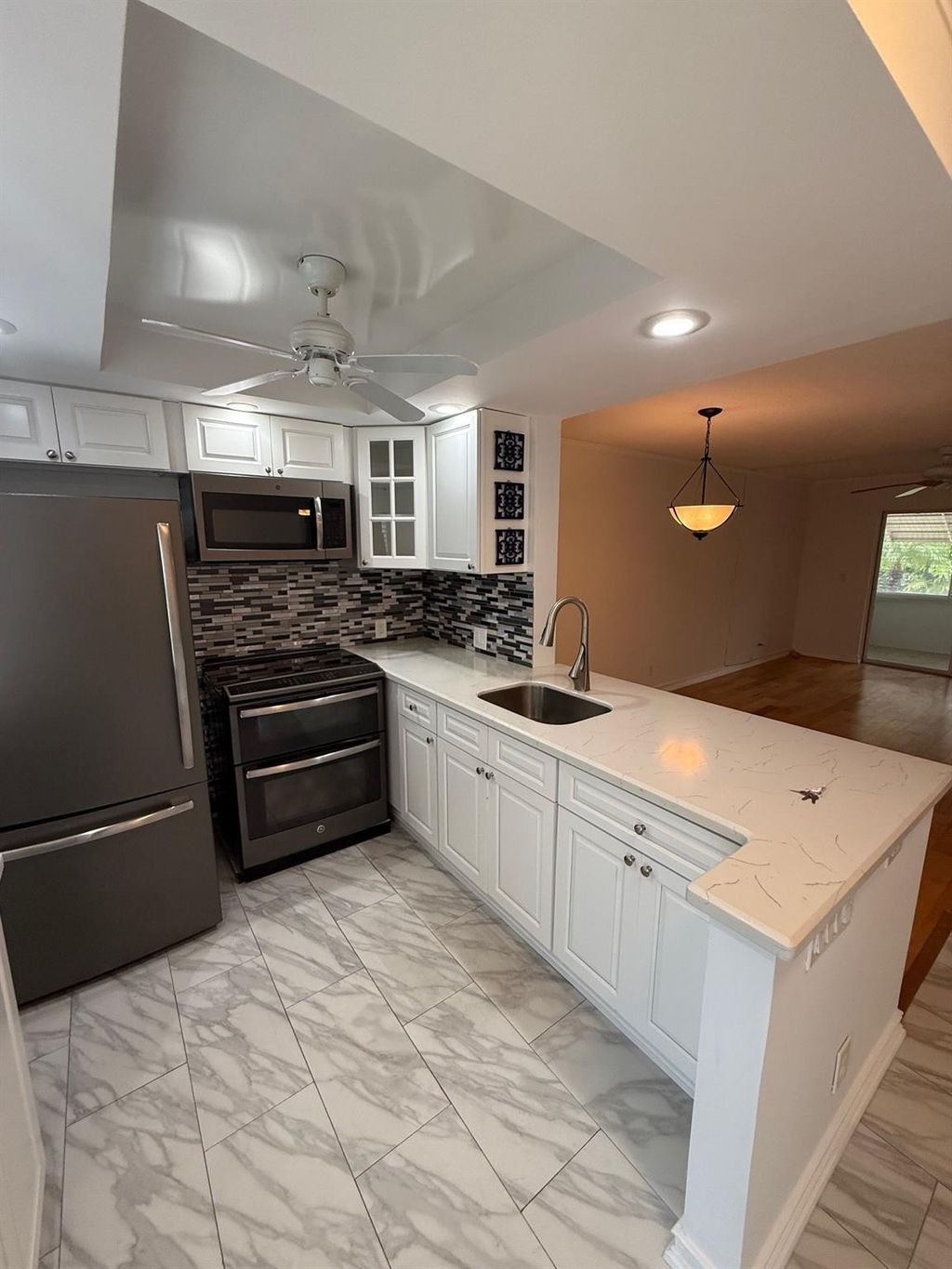 Photo of 2141 NE 1st Court #102, Boynton Beach, FL 33435 (MLS # F10527088)