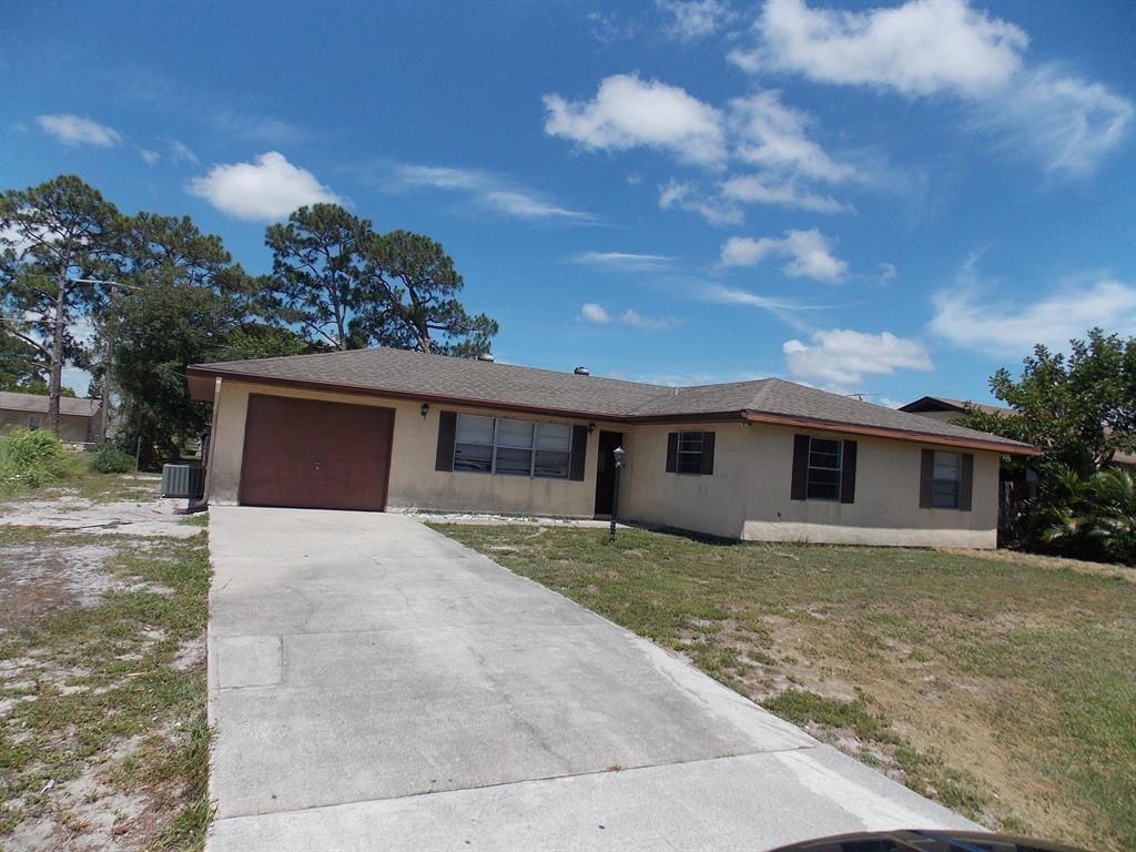 Photo of 170 NW Curry Street, Port Saint Lucie, FL 34983 (MLS # R10806198)