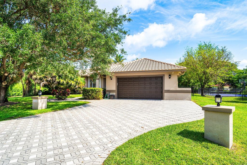 Photo of 11600 NW 5th Street, Plantation, FL 33325 (MLS # B26028550)