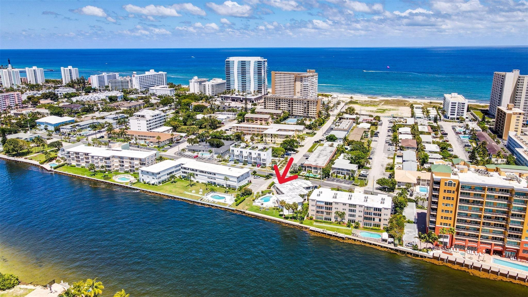 Breathtaking million-dollar views make this unit perfect for living or investment. Enjoy direct Intracoastal Waterway and pool views from every room. Turnkey spacious 1 bed + den/office with tile throughout, a newly installed window and dishwasher, well-maintained, and tastefully decorated. Amenities include a pool overlooking the Intracoastal, BBQ area, and laundry room. Manicured grounds only 5minutes walk to the beach. No land lease, low maintenance fees, investor-friendly with rentals allowed in the first year of ownership. No pets.
