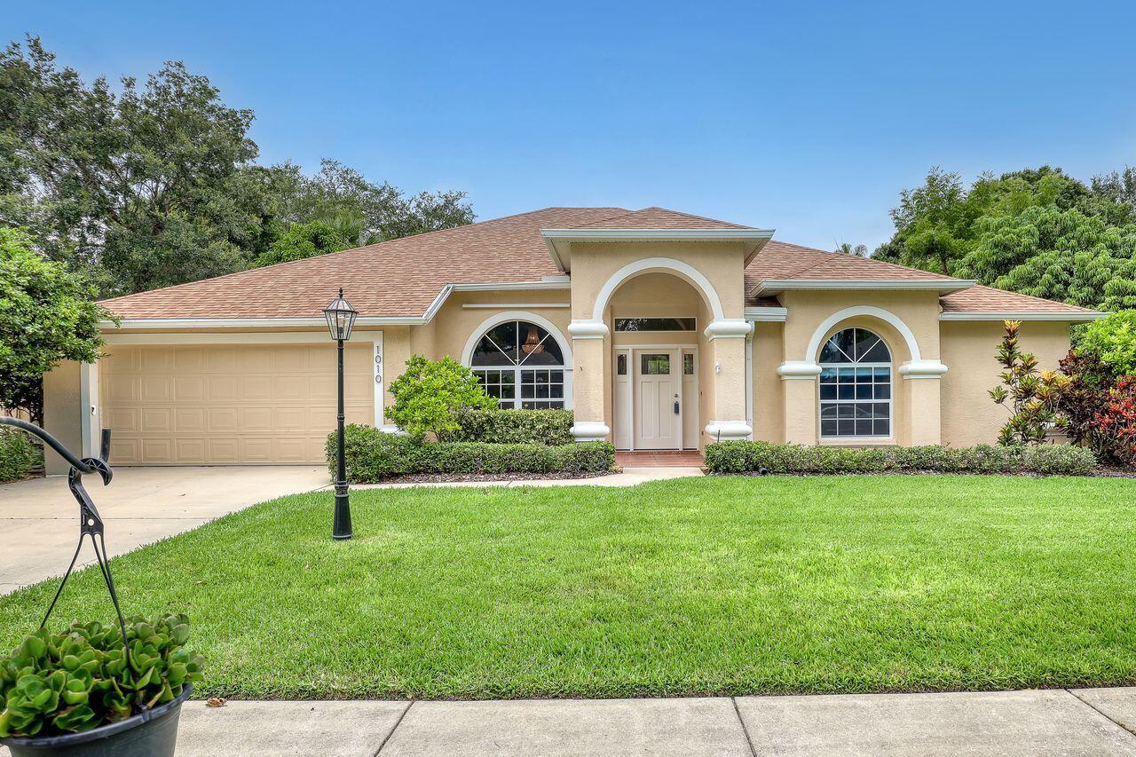 HONEY! STOP THE CAR LETS BOOK A SHOWING... Bring your family and turn this 4-bedroom 3 bath house into a home for making lasting memories. Perfectly located within the quaint gated community of Forest Creek, a community that boasts of charm and known for its tree lined street and generous space between homes for privacy. As you arrive instantly feel at home as you walk up to a new and modern front door before entering into an open formal dining and living area. Open kitchen overlooking casual living creating a seamless space for cooking, relaxing & entertaining. Split floor plan with large primary bedroom and ensuite, large shower and large walk-in closet. The primary bedroom also has private sliders entering the back screened in patio with hurricane fabric rolldown for privacy
