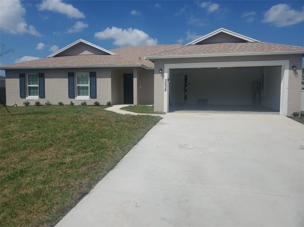 Photo of 2538 SW Deckard St, Port Saint Lucie, FL 34953 (MLS # F10324411)