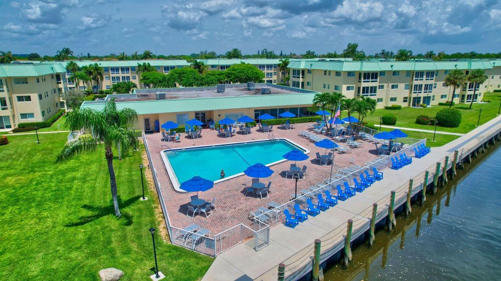 Photo of 3 Colonial Club Drive #103, Boynton Beach, FL 33435 (MLS # R10932251)