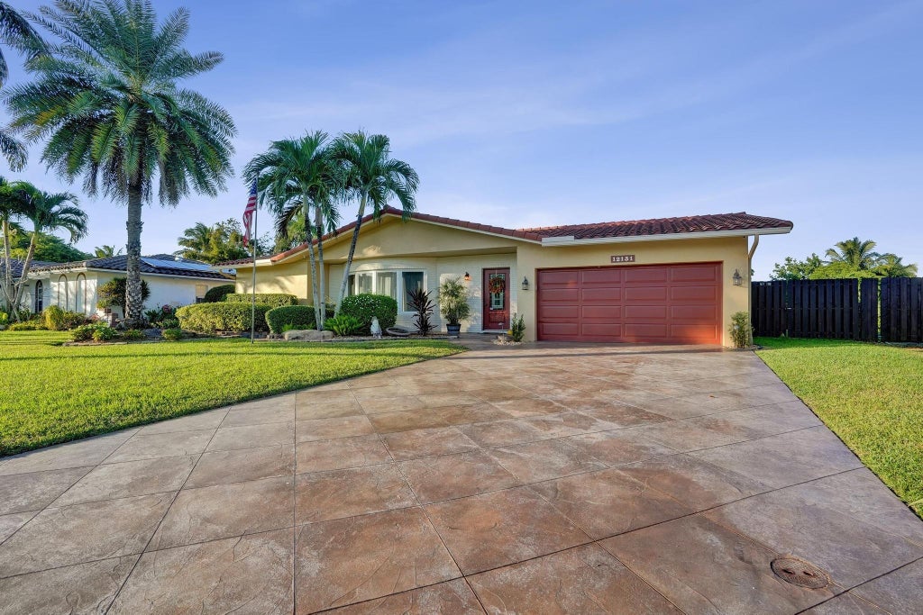 Photo of 12131 NW 32nd Court, Coral Springs, FL 33065 (MLS # F10538298)