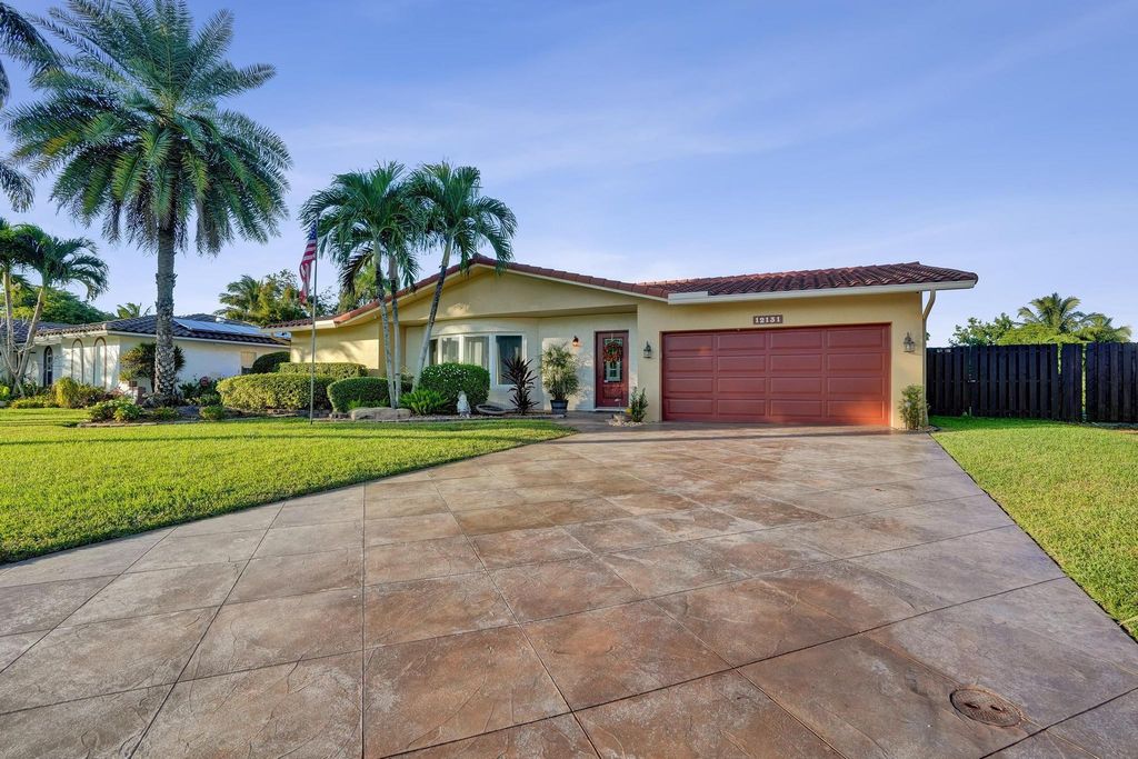 Photo of 12131 NW 32nd Ct, Coral Springs, FL 33065 (MLS # F10538298)