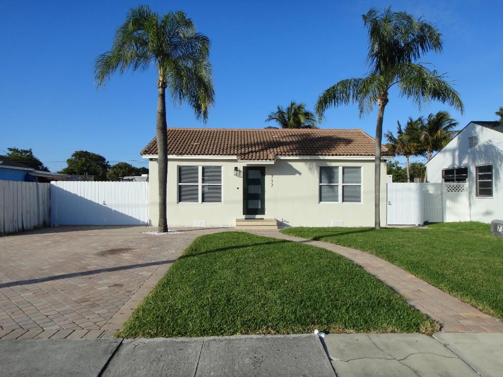 Photo of 717 Bunker Road, West Palm Beach, FL 33405 (MLS # R11157978)