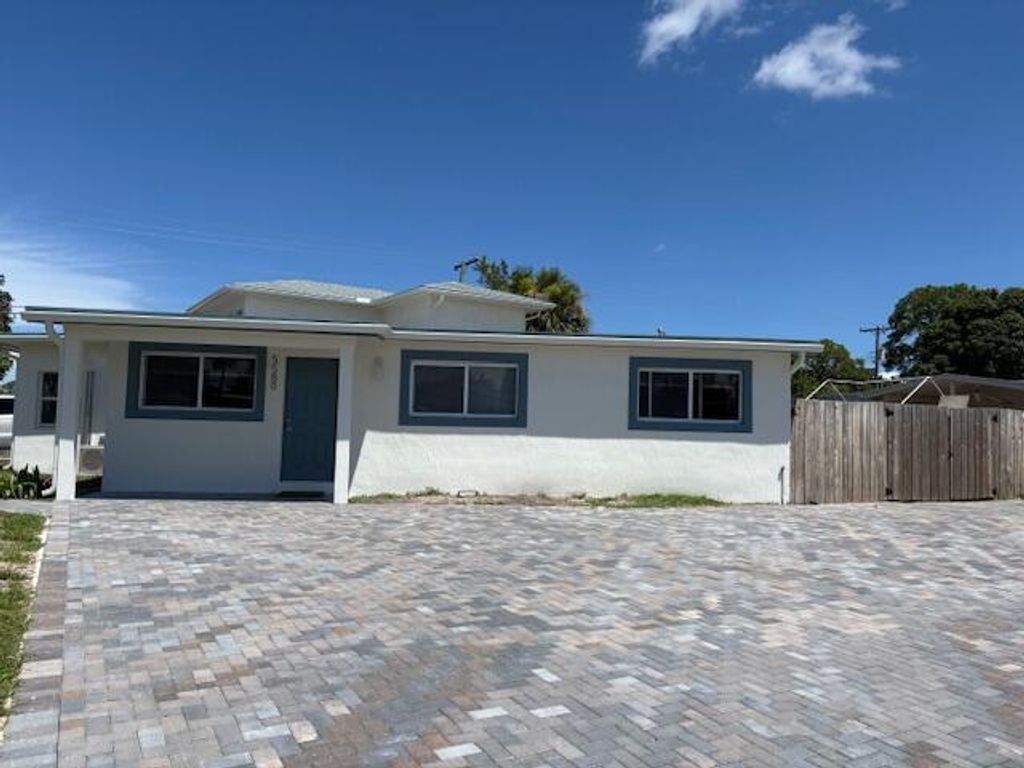 Photo of 5580 Honeysuckle Drive #Main House, West Palm Beach, FL 33415 (MLS # R11110286)