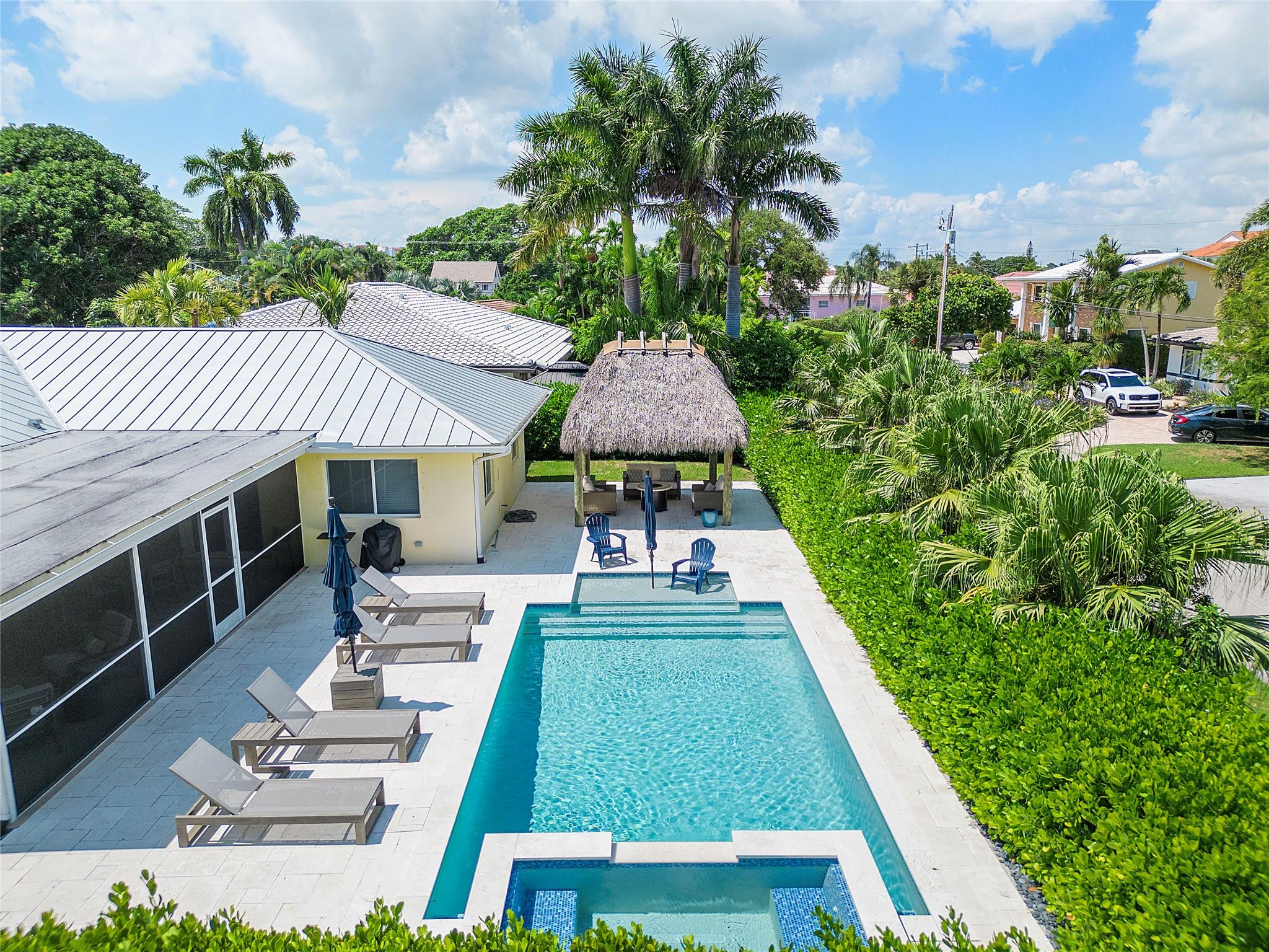 ATTRACTIVE OWNER FINANCING AVAILABLE – Up to $1 million. This turnkey home is situated on a beautiful cul de sac street in a secluded pocket of East Boynton Beach. Vacationers have been enjoying the crystal clear swimming pool and hot tub during the day and the fire pit by the tiki hut in the evenings. 5 stars consistently! Its proximity to highways, waterways and beaches are just one of the many highlights of this property. It is a must see house. Photos do not convey the complete experience of driving through this lovely HOA FREE neighborhood.