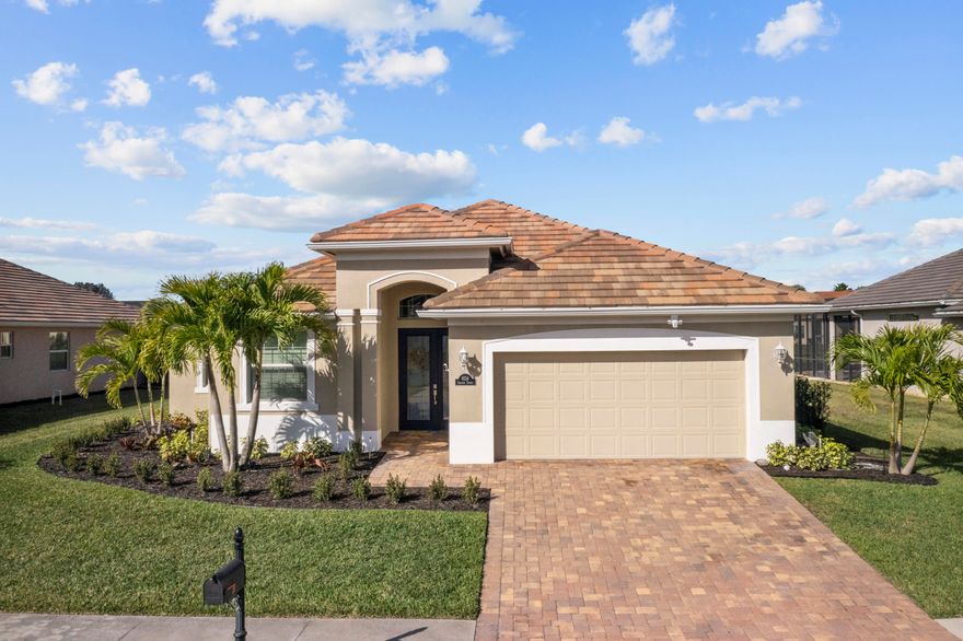 *SPACIOUS* TASTEFULLY DECORATED- 3 BEDS, 2.5 BATHS HOME, OVER 2100 SQ. FT. W/ A SERENE WATER VIEW. THIS RICHLY APPOINTED NEWER HOME BOASTS HUGE CEILINGS & TALL DOORWAYS W/DEEP GARAGE. KITCHEN HAS 52'' CABINETS, GRANITE COUNTERTOPS. MASTER BEDROOM COFFER CEILING. POCKET DOORS TO BRICK PAVERS, COVERED PATIO. FRESHLY PAINTED WALLS, CEILINGS, INTERIOR OF GARAGE. NEW LIFETIME LUXURY VINYL PLANK FLOORING THROUGHOUT. ALL NEW CEILING FANS, LIGHTS, BATH FAUCETS, CABINETS, VANITY IN HALF BATH, DEEP FILL WASHER & DRYER, REFRIGERATOR, IRRIGATION PUMP, AIR CONDITIOING LINE & INSULATION, SPRINKLER HEADS, & CHAIR HEIGHT TOILETS. SPACIOUS FENCED YARD W/ PLENTY OF ROOM FOR A POOL! HOME IS 8 MINUTES TO WABASSO BEACH. GATED COMMUNITY & CONVENIENTLY LOCATED TO SHOPPING, HIGHWAYS, RESTAURANTS & LOCAL ACTIVITIE S. 3RD BEDROOM HAS A CLOSET, BUT NO DOOR, W/AN ARCHED ENTRYWAY, AND CURRENTLY BEING USED AS AN OFFICE/DEN. SPLIT FLOOR PLAN FOR PRIVACY. THE SUMMER LAKE COMMUNITY HAS A PUBLIC DOCK, PARK, AND DOG PARK, BBQ/PICNIC AREA.