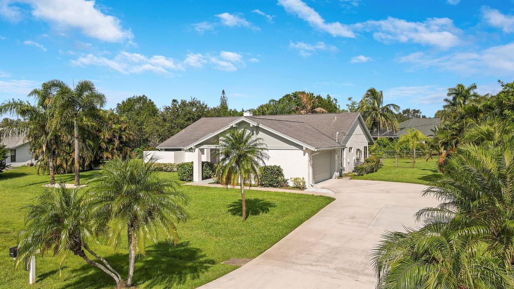 Photo of 1872 SE Elrose Street, Port St Lucie, FL 34952 (MLS # R10919946)