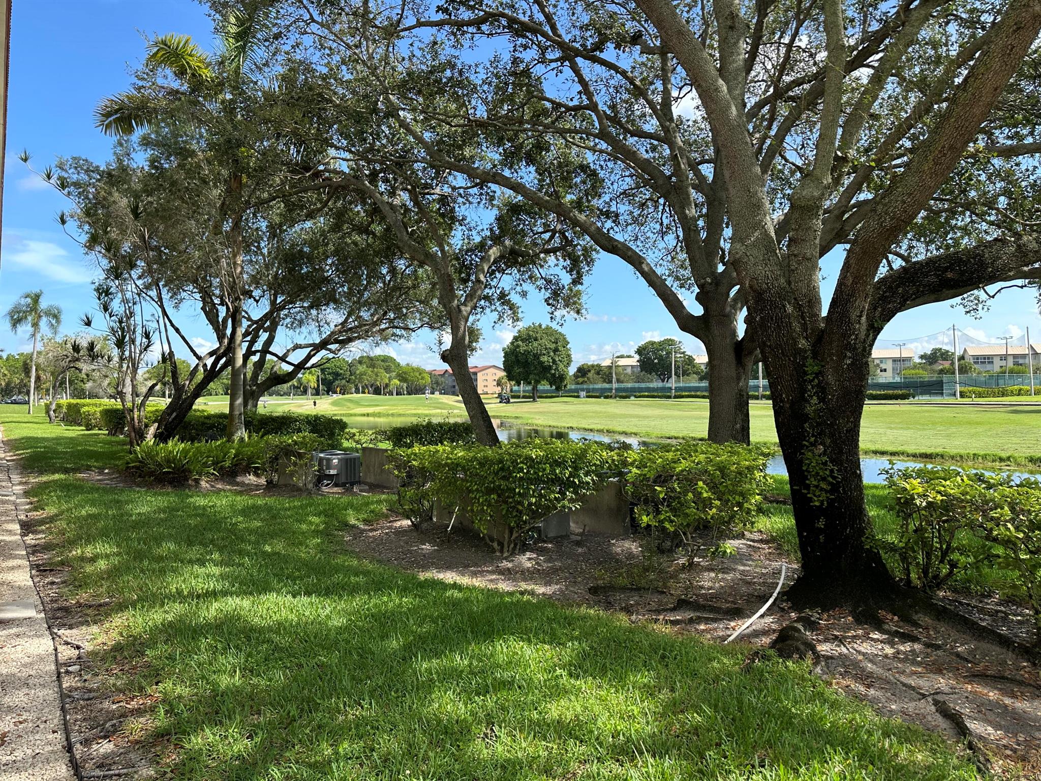 Lovely & Spacious 2 Bedroom, 2 Bath First-Floor Condo with Golf & Water Views, Welcome to this nicely maintained 1st floor unit in a top-rated 55+ community, offering stunning views of the golf course and serene water right from your enclosed patio--perfect for added living space and year-round enjoyment. Enclosed Patio with Window, In-Unit Washer & Dryer, Walk-In Closet,Tile Flooring in Kitchen, Breakfast Nook, Foyer & Patio Enjoy the comfort and convenience of a well-kept condo just steps from the clubhouse, heated pool, golf course, tennis courts, house of worship, medical center, Liberty, restaurants, and public transportation. You're also conveniently located near Pembroke Gardens, Pembroke Pines Mall, and I-75 for easy access to shopping and travel.