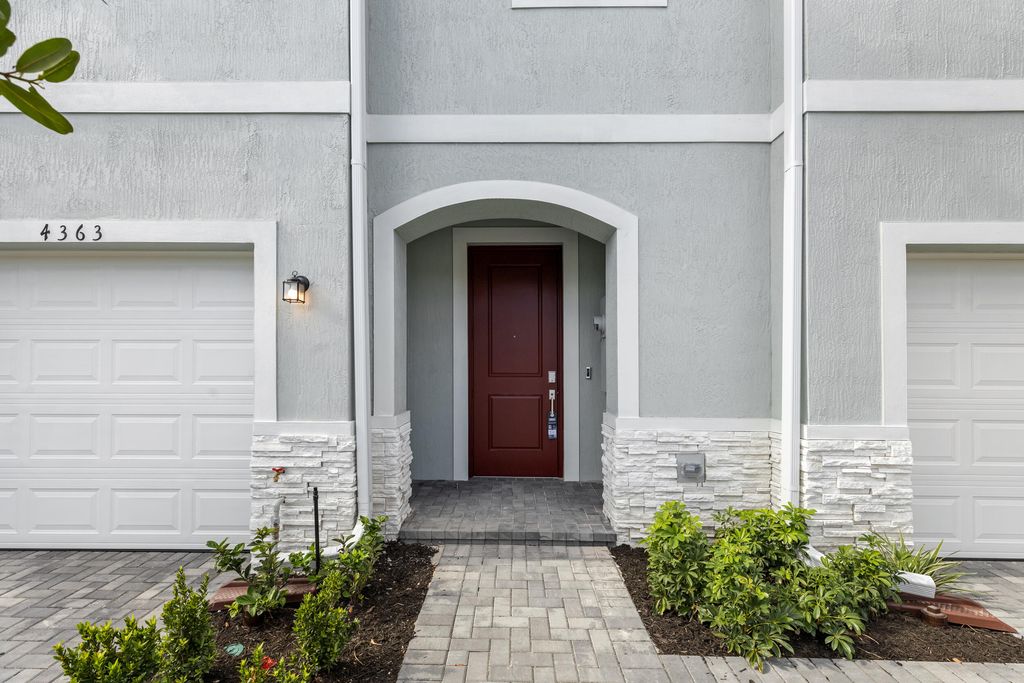 Photo of 4250 Lagoon Shore Drive, Lake Worth, FL 33467 (MLS # R11159678)