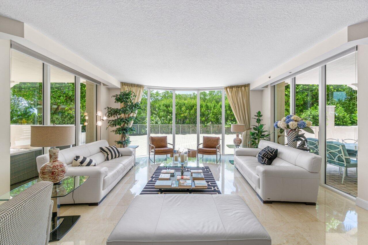 Outstanding 3 bedroom, 3 full and one-half bath corner residence at with impeccable furnishings and spacious living quarters is available for seasonal rent. This extraordinary residence also offers a private outdoor patio encompassing an additional 3,000 sq. ft. surrounded by greenspace, generous kitchen and breakfast area, split bedroom plans plus a den. Amenities include a fabulous oceanfront beach club directly on the sand with towels and chairs, 3 pools, tennis courts, card rooms, billiards, and state of the art gym. 24 hour manned gate, concierge and valet parking!