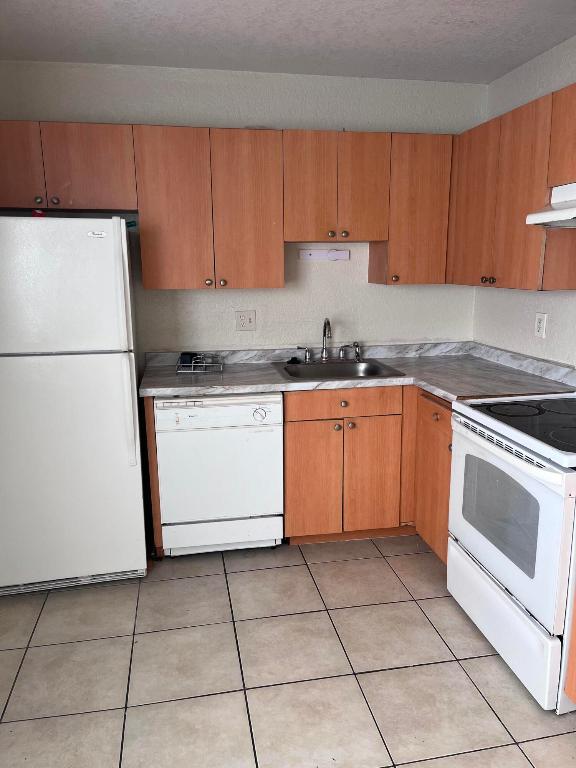 TOWNHOUSES OF PLANTATION - Residential