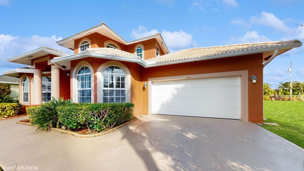 Photo of 4173 SW Baird Street, Port Saint Lucie, FL 34953 (MLS # R10956554)