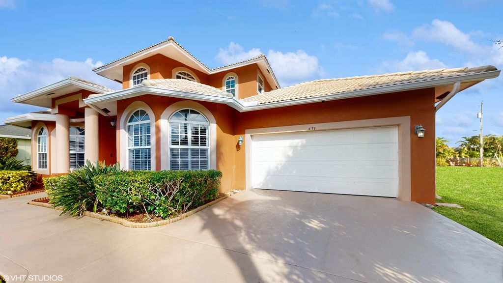 Photo of 4173 SW Baird Street, Port Saint Lucie, FL 34953 (MLS # R10956554)