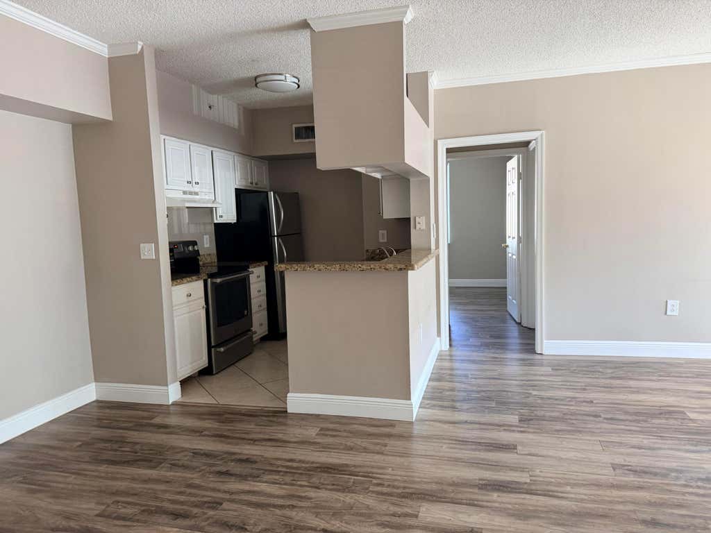 Photo of 11661 W ATLANTIC Boulevard #1026, Coral Springs, FL 33071 (MLS # B26063678)