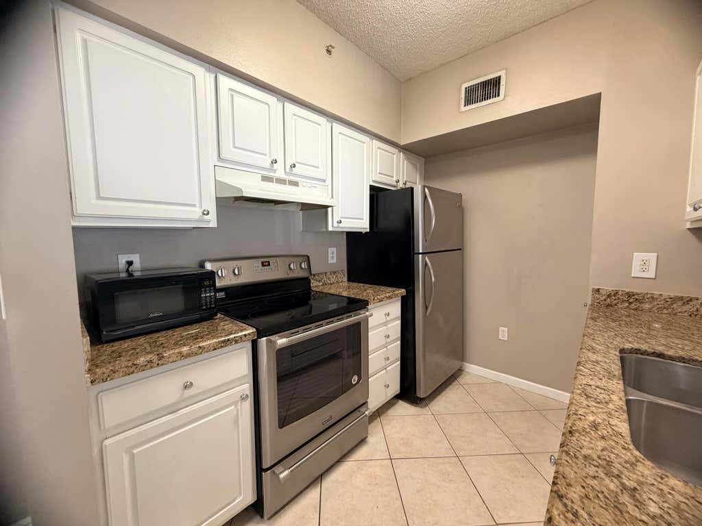 Photo of 11661 W ATLANTIC Boulevard #1026, Coral Springs, FL 33071 (MLS # B26063678)