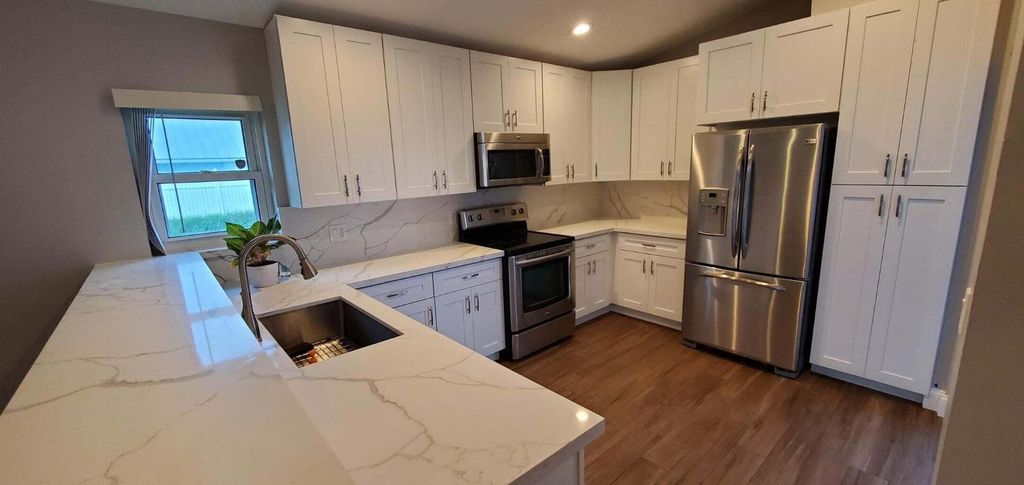 Photo of 6294 Hollywood Street, Jupiter, FL 33458 (MLS # R10935843)