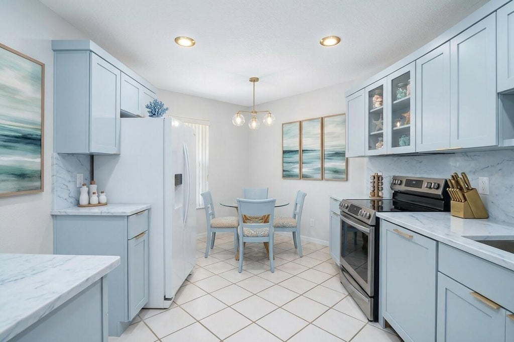 Photo of 7 Southport Lane #B, Boynton Beach, FL 33436 (MLS # R11169640)