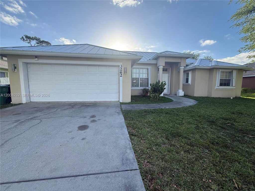 Photo of 3262 SW Cohutta Street, Port Saint Lucie, FL 34953 (MLS # A12008232)