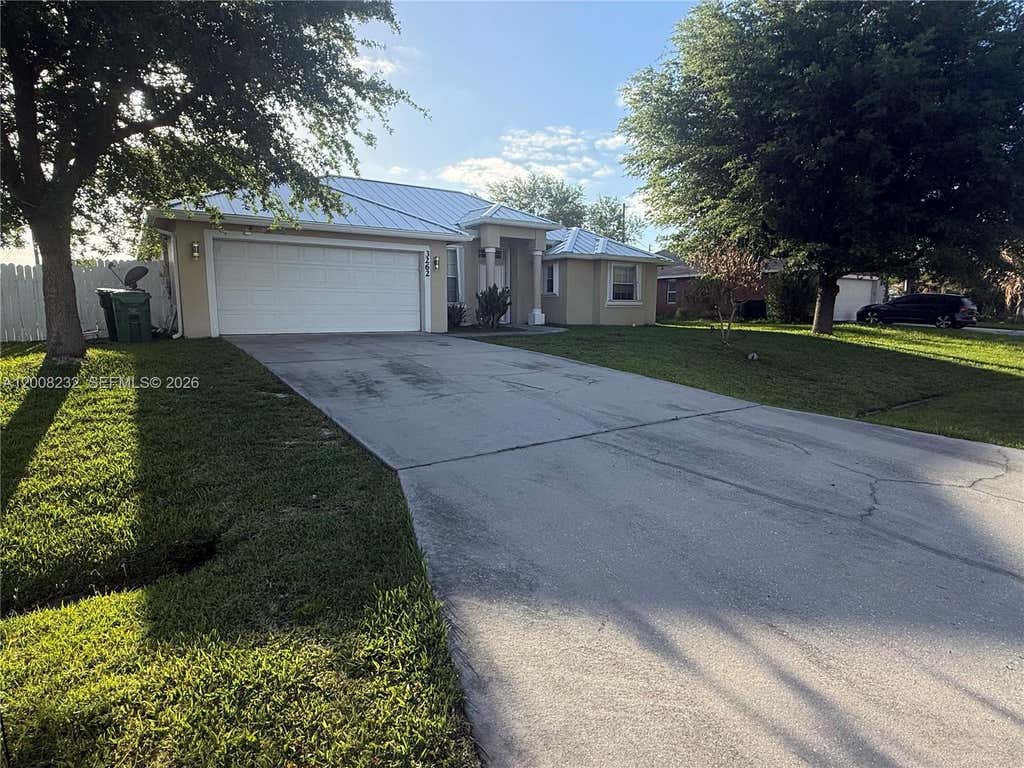 Photo of 3262 SW Cohutta Street, Port Saint Lucie, FL 34953 (MLS # A12008232)