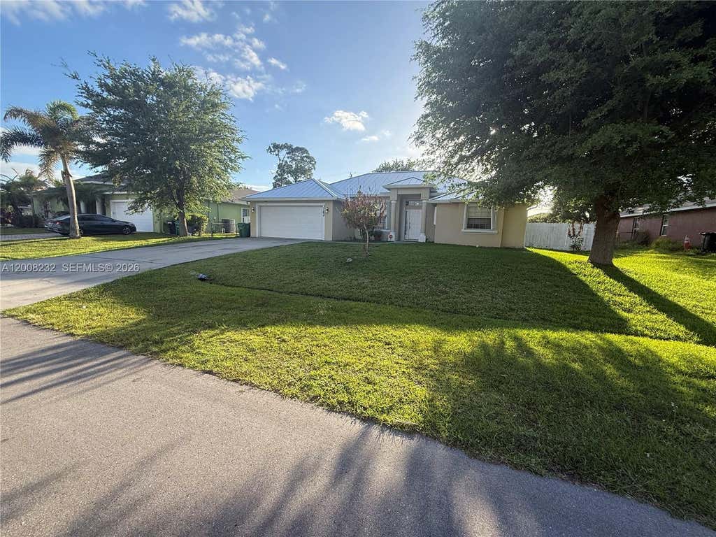 Photo of 3262 SW Cohutta Street, Port Saint Lucie, FL 34953 (MLS # A12008232)