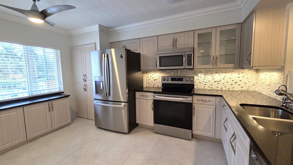 Photo of 5777 Gemstone Court #207, Boynton Beach, FL 33437 (MLS # R11164327)