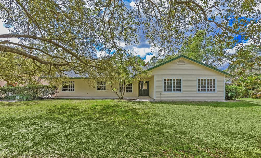Photo of 16244 E Downers Drive E, The Acreage, FL 33470 (MLS # B26003968)
