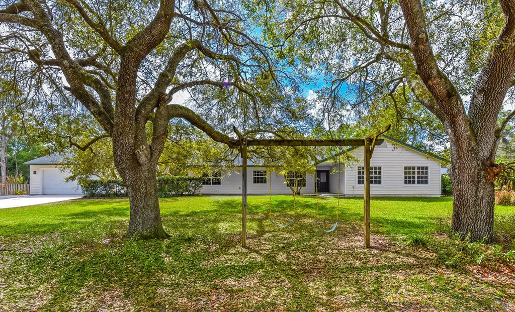 Photo of 16244 E Downers Drive E, The Acreage, FL 33470 (MLS # B26003968)