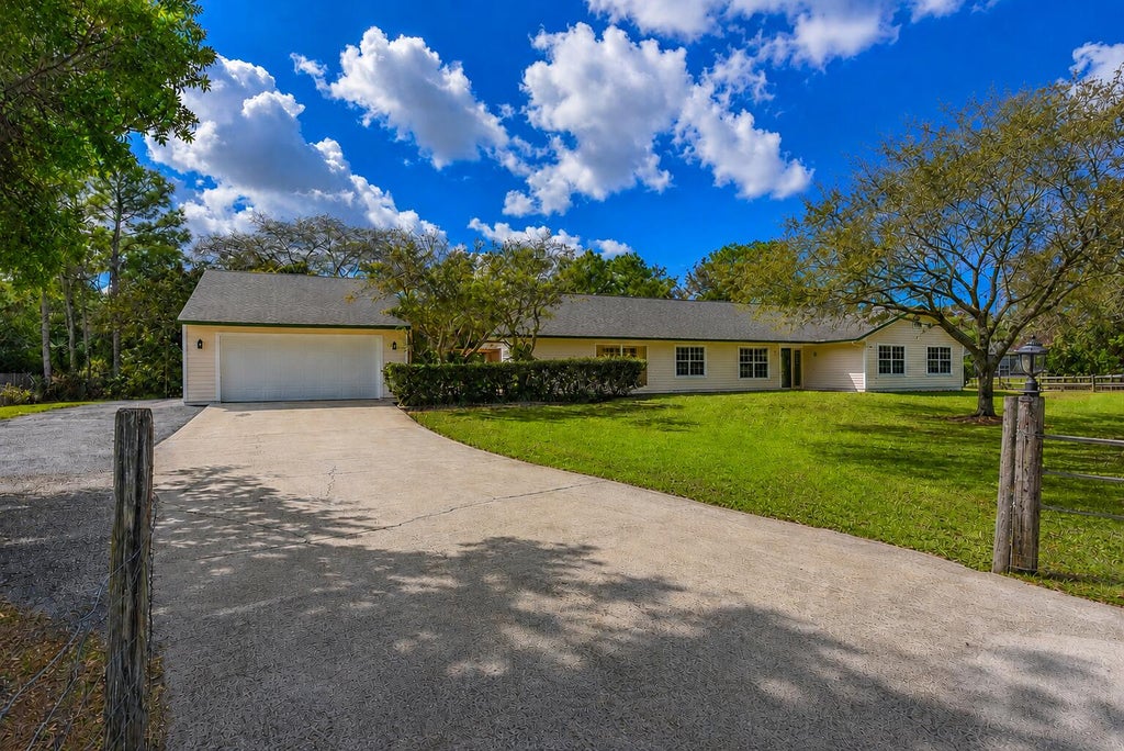 Photo of 16244 E Downers Drive, Loxahatchee, FL 33470 (MLS # B26003968)