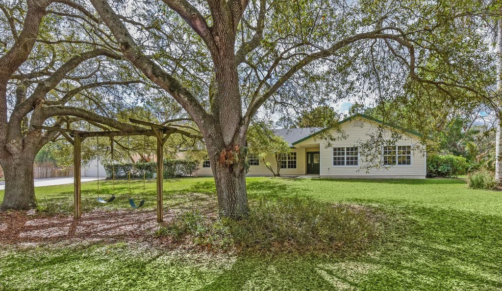Photo of 16244 E Downers Drive E, The Acreage, FL 33470 (MLS # B26003968)