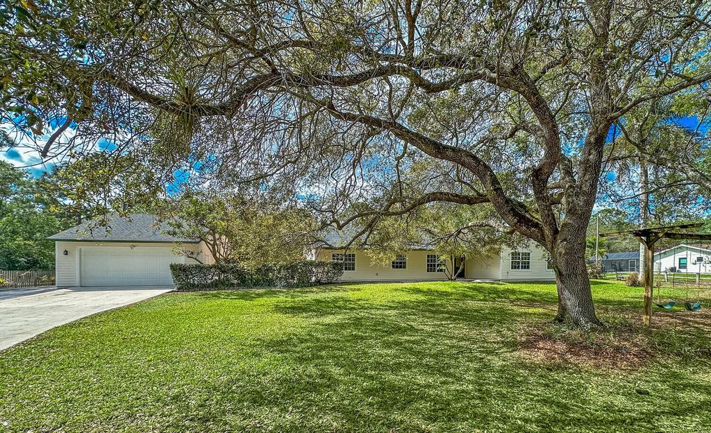 Photo of 16244 E Downers Drive E, The Acreage, FL 33470 (MLS # B26003968)