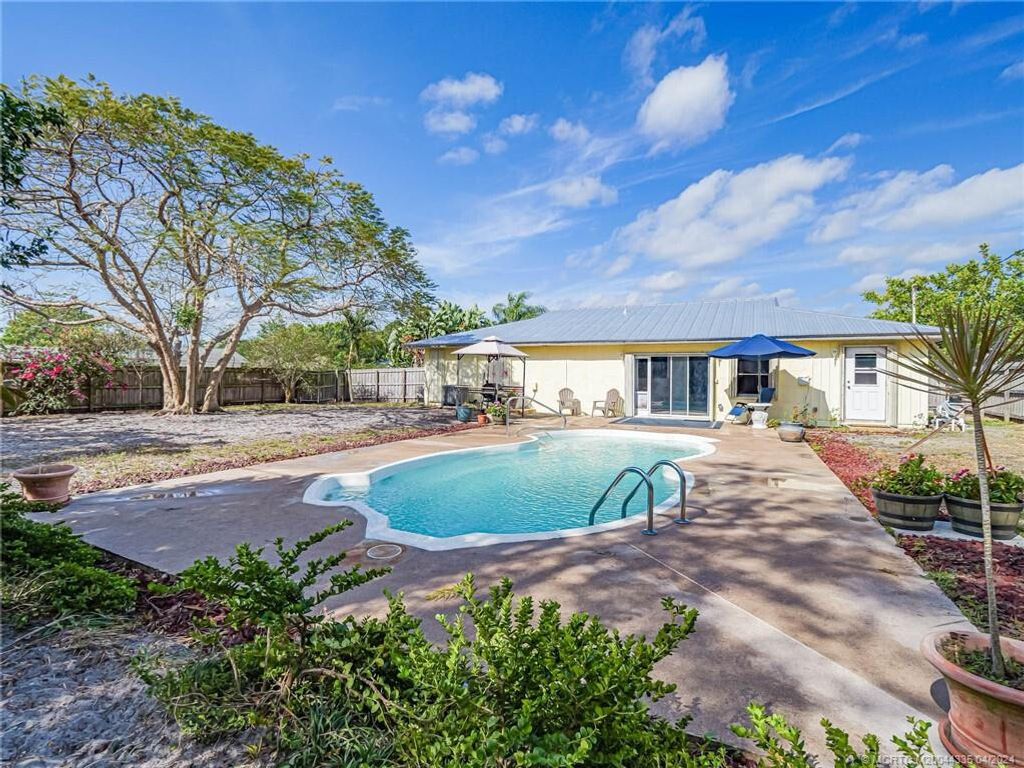 Photo of 679 SE Forgal Street, Port Saint Lucie, FL 34983 (MLS # R10976796)