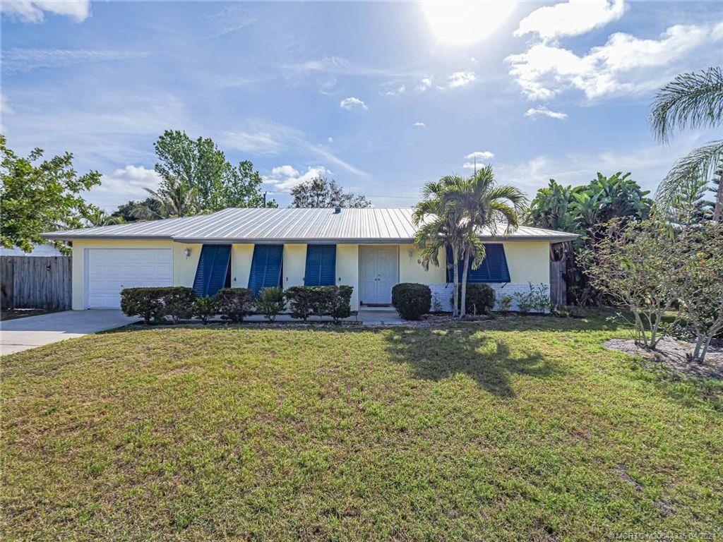 Photo of 679 SE Forgal Street, Port St Lucie, FL 34983 (MLS # R10976796)