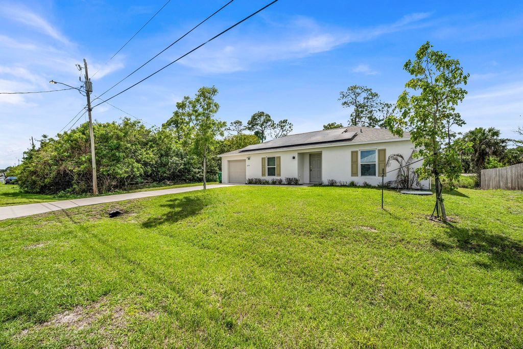 Photo of 6276 NW Gisela Street, Port Saint Lucie, FL 34986 (MLS # B26014749)